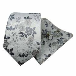 Ensemble cravate gris clair à motifs fleuris argentés et anthracite, avec pochette de costume et boutons de manchette